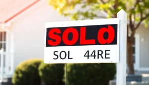 A professional sold sign with bold lettering on a wooden stake, designed for real estate listings, ensuring high visibility and impact.